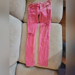Vintage Roxy super skinny fit size 3 pink distressed jeans, with studs. Pink.